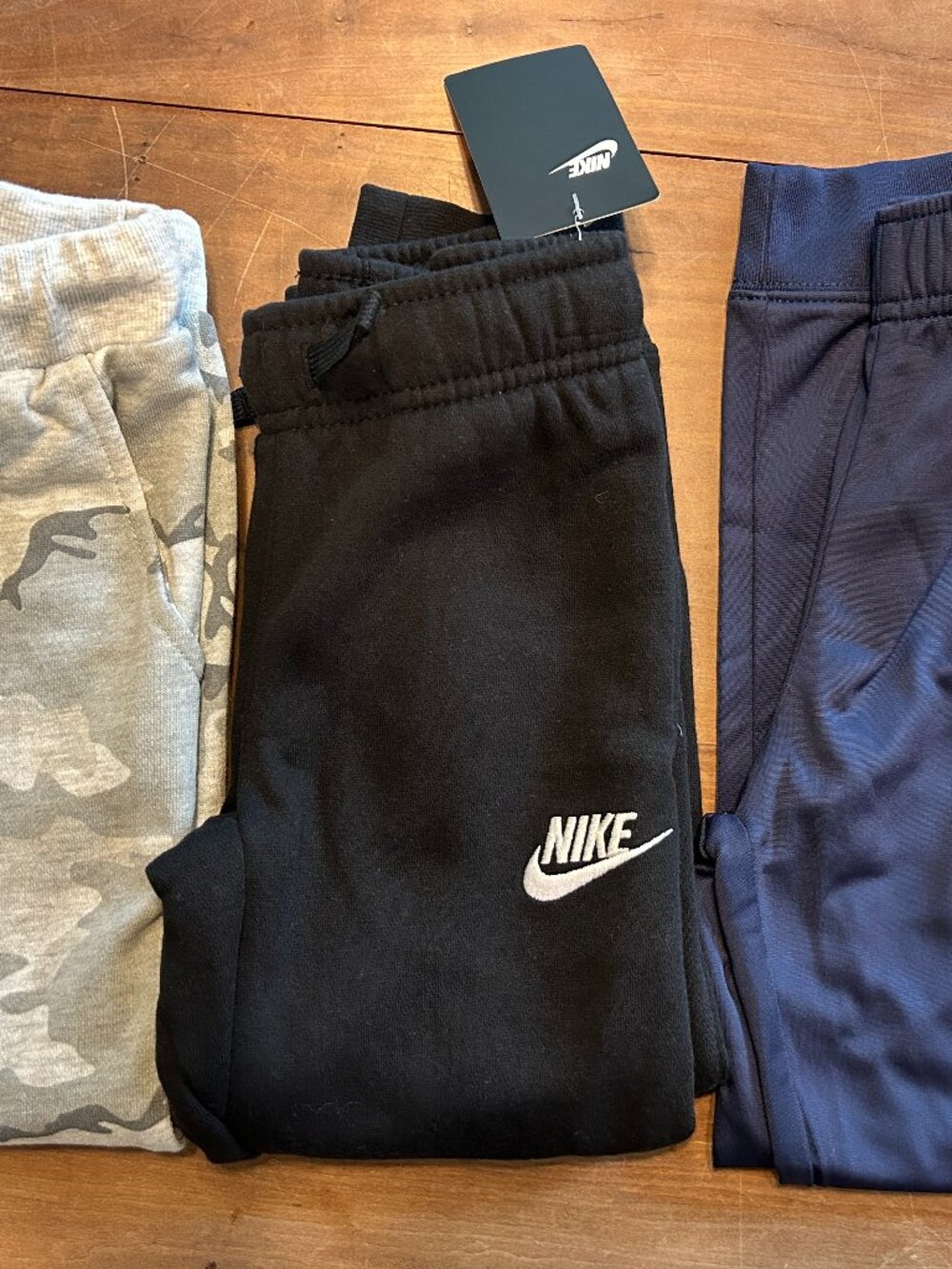 Pair of Nike Sweatpants, NWT, Boys Size 5, Black , Navy, & Sovereign Code Camo,